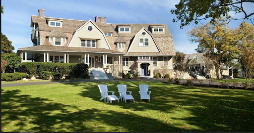 Exterior view of Adam Sandler's house showcasing its luxurious design and serene surroundings